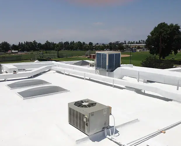 Durable Insulated Roof with Urethane Coating Commercial Polyurethane Spray Foam Roofing Colton, CA